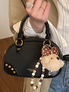Vintage black PU leather bowling bag with gold studs and a cute plush bear charm