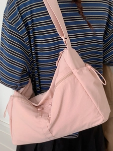 Pink minimalist large capacity nylon messenger bag with adjustable wide shoulder strap