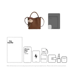 Detail view of small dark brown leather bucket bag showing capacity for phone and accessories