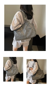 Detailed views of gray vintage tote bag with decorative zippers and wide shoulder strap