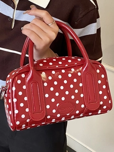 Chic red polka dot glossy patent leather handbag with top handles and retro square design