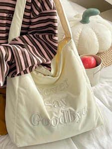 Minimalist cream white canvas tote bag with 3D Never Say Goodbye embroidery