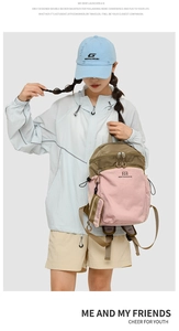 Detail of multi-color hiking backpack with mini coin purse and double zipper design