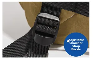 Macro detail of adjustable shoulder strap buckle and khaki green nylon fabric texture