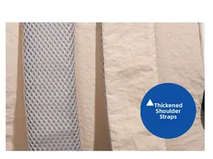 Detailed macro view of thickened shoulder straps with breathable mesh for comfort