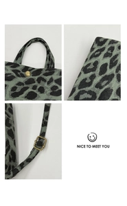 Détails du sac à main léopard avec boucles en bronze et texture de tissu robuste et chic