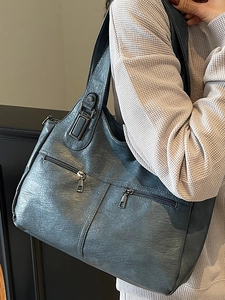 Elegant dark grey oil wax leather tote bag with functional exterior zipper pockets