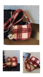 Macro detail of red plaid plush crossbody bag with fluffy texture and teddy bear charm