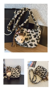 Close-up of leopard print plush saddle bag with teddy bear charm and pearl tassel