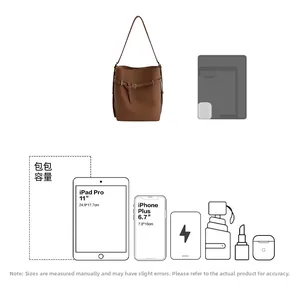 Detailed size guide for brown leather bucket bag showing 11-inch iPad Pro fit