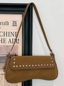 Retro brown underarm bag with silver rivets and matte leather finish for women