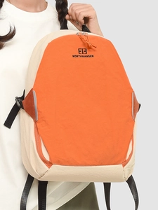 Minimalist color-block backpack in orange and beige with high capacity for commuting