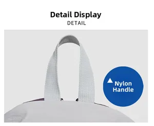 Close-up of the high-density grey nylon carry handle on the lightweight travel backpack