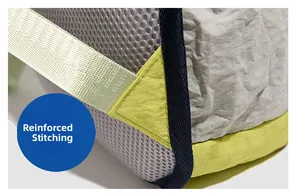 Detailed macro view showing reinforced stitching on the blue nylon hiking backpack strap