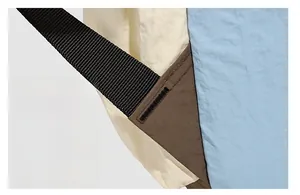 Detail shot of reinforced stitching and durable fabric on a drawstring backpack