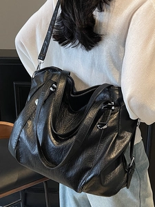 Sac fourre-tout noir grande capacité au design minimaliste avec bandoulière réglable