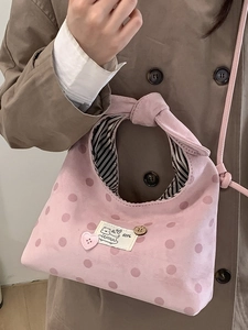 Pink polka dot handbag with bow knot handle and cute dog tag for stylish women