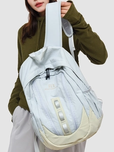 Sac à dos décontracté bleu clair et beige contrasté pour étudiants et voyage en plein air