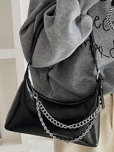 Chic black crescent hobo bag for women with silver chain detail and slim leather strap
