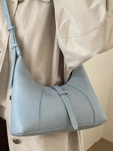Chic light blue half-moon underarm shoulder bag with silver ring buckle and adjustable strap