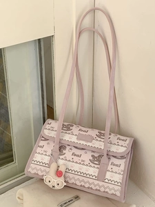 Pink tote bag with cute foal and bow patterns, including a plush rabbit keychain