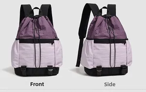 Front and side view of large capacity drawstring backpack in purple and black