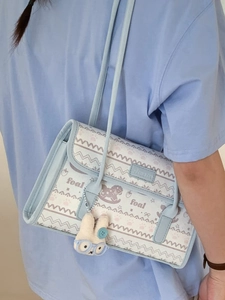 Cute light blue tote bag with 'foal' print, strawberry patterns and rabbit plush pendant