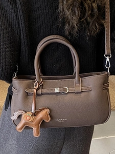 Deep brown lychee pattern leather tote bag with round handles and horse charm