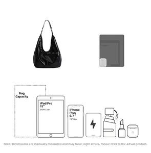 Détail montrant la grande capacité du sac hobo noir pour iPad Pro et objets du quotidien