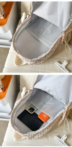 Internal view of a floral school backpack showing spacious compartments for laptop and tablet