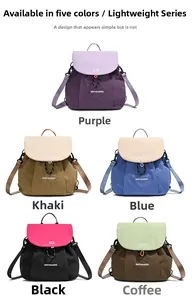 Flat lay of casual backpacks in five colors showing drawstrings and flap closure