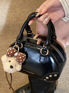 Vintage black shiny mini square handbag with top handle and plush bear charm