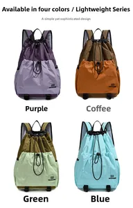 Detail of four lightweight nylon drawstring backpacks in various two-tone color options
