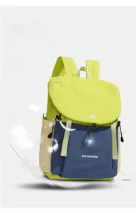 Close-up of lightweight tricolor nylon backpack featuring Northnansen branding and feathers
