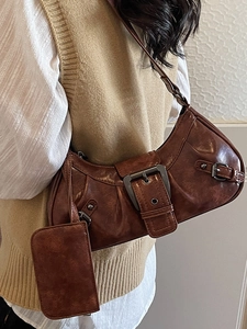 Retro brown oversized shoulder bag with vintage crinkled leather and metal buckle details