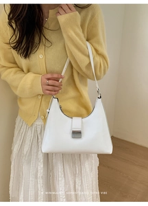 Minimalist white faux leather hobo bag with elegant silver buckle detail for women