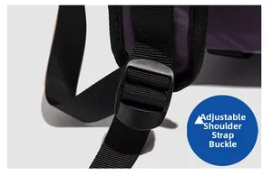 Detail view of the adjustable black plastic shoulder strap buckle on the purple outdoor backpack
