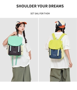 Detail showing drawstring closure and side pockets of color-block travel backpacks