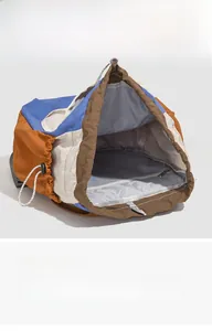 Internal view of large capacity vintage backpack showing space for iPad and essentials