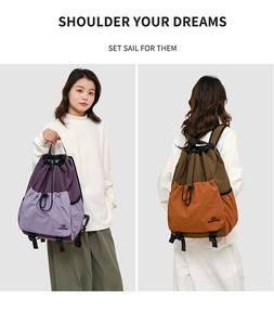Detail of drawstring nylon hiking backpack with waterproof material and dual color splicing