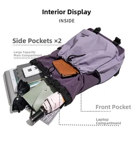 Detailed top view of purple nylon backpack interior with laptop compartment and pockets
