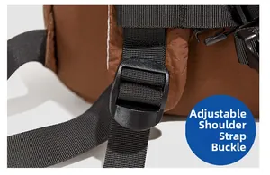 Close-up of adjustable strap buckle on a durable brown nylon backpack with reinforced webbing