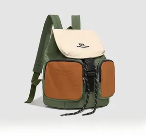 Detail view of the multi-color waterproof nylon backpack with secure buckles and zippers