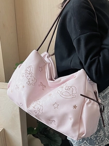 Pink large capacity tote bag with embossed rocking horse motifs and shoulder straps