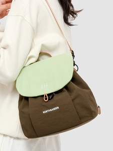 Modern light green and brown contrast backpack with adjustable straps for women