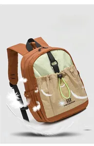 Detail showing the lightweight nylon fabric and multi-color patchwork design of the backpack
