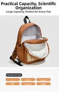 Interior detail of casual brown nylon backpack showing large capacity and multi-layer pockets