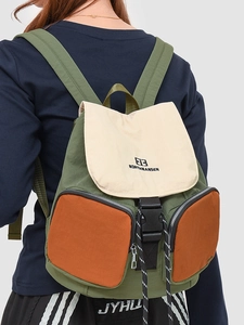 Large capacity waterproof backpack in green and beige featuring orange zip pockets