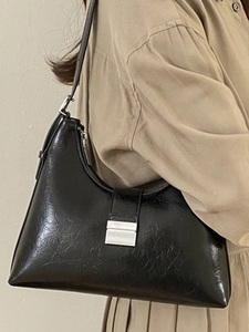 French retro black underarm bag with glossy pleated texture and silver buckle for women