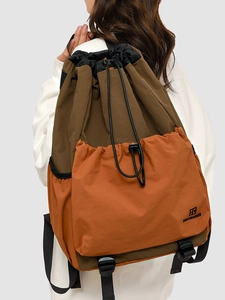 Outdoor camping drawstring backpack in brown and orange nylon by NORTHNANSEN
